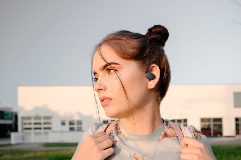 Close up portrait of a beautiful teenage girl with stickers on her face